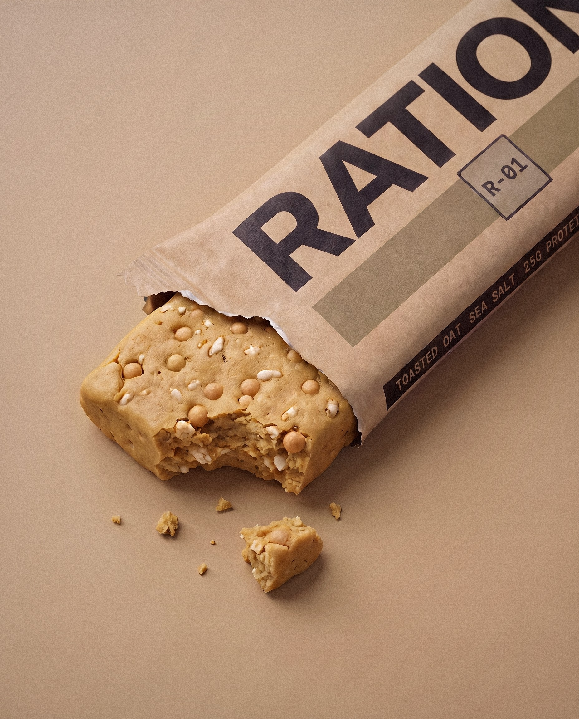 Studio render of the R-01 Toasted Oat · Sea Salt bar in its printed wrapper.