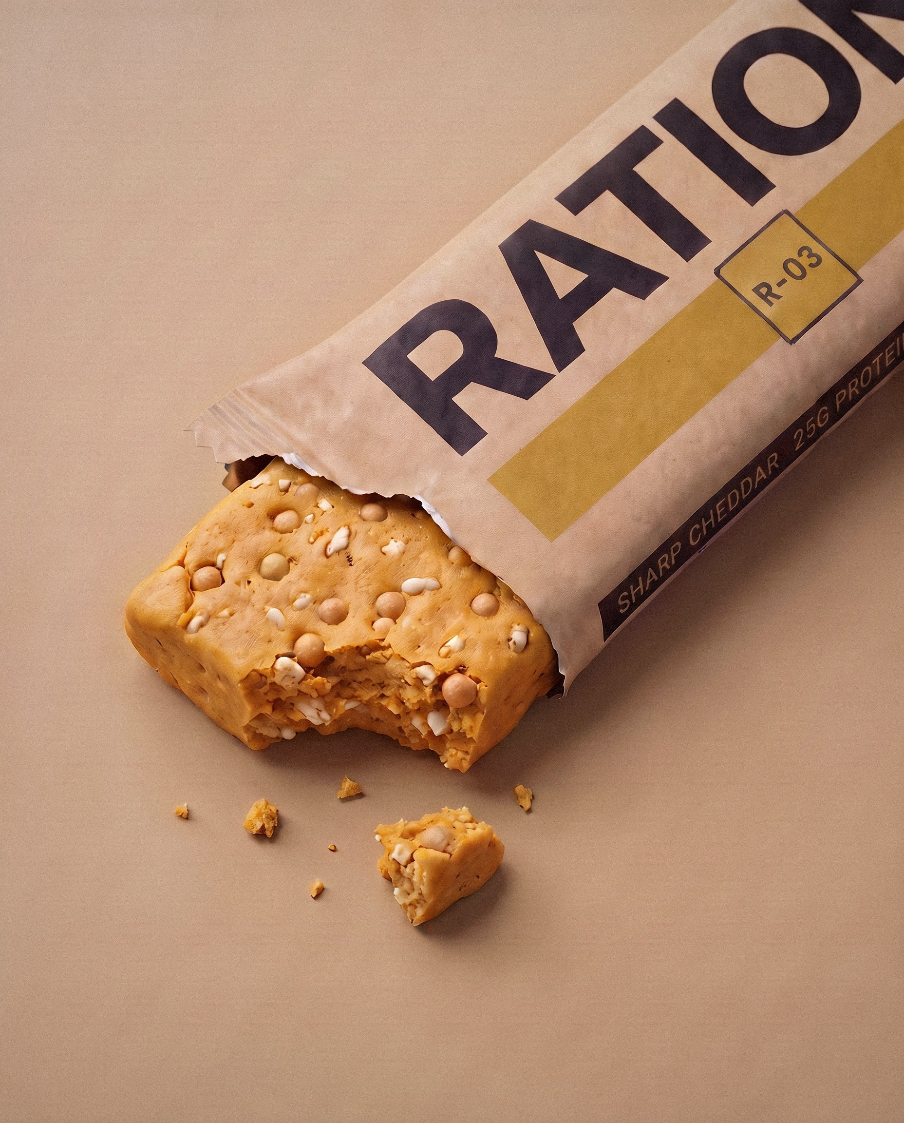 Studio render of the R-03 Sharp Cheddar bar in its printed wrapper.